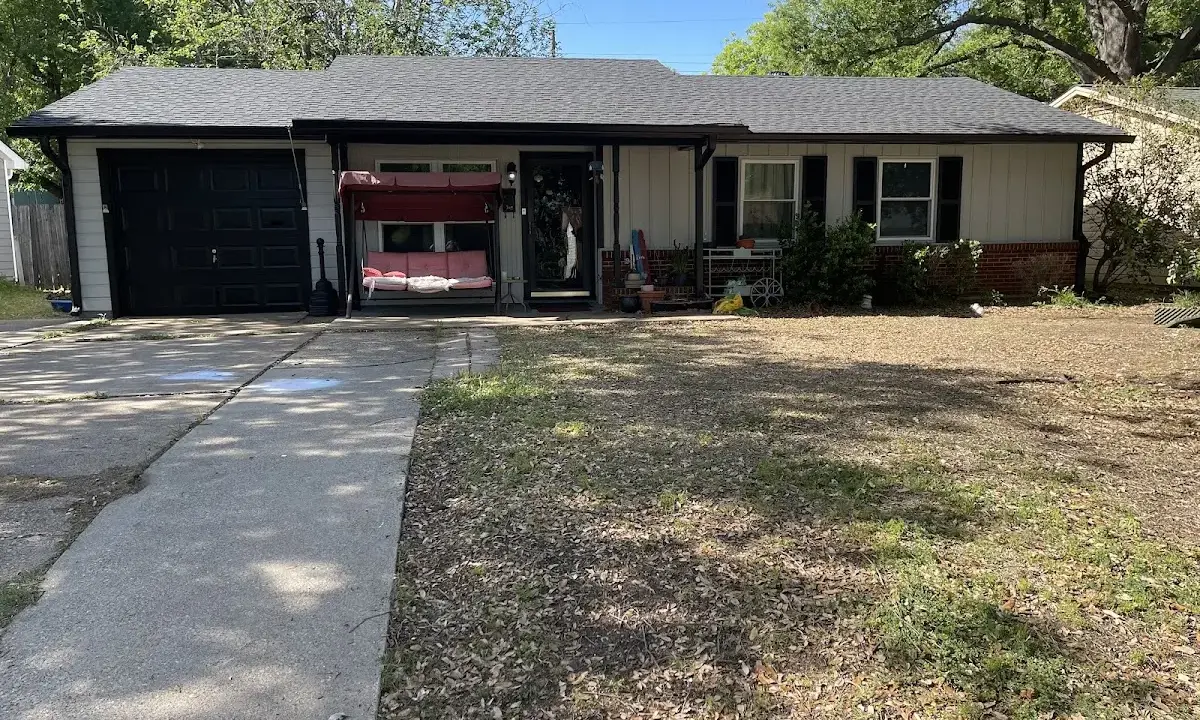 Asphalt Shingle Roof Repair crew at work on a residential roof in Tuscumbia